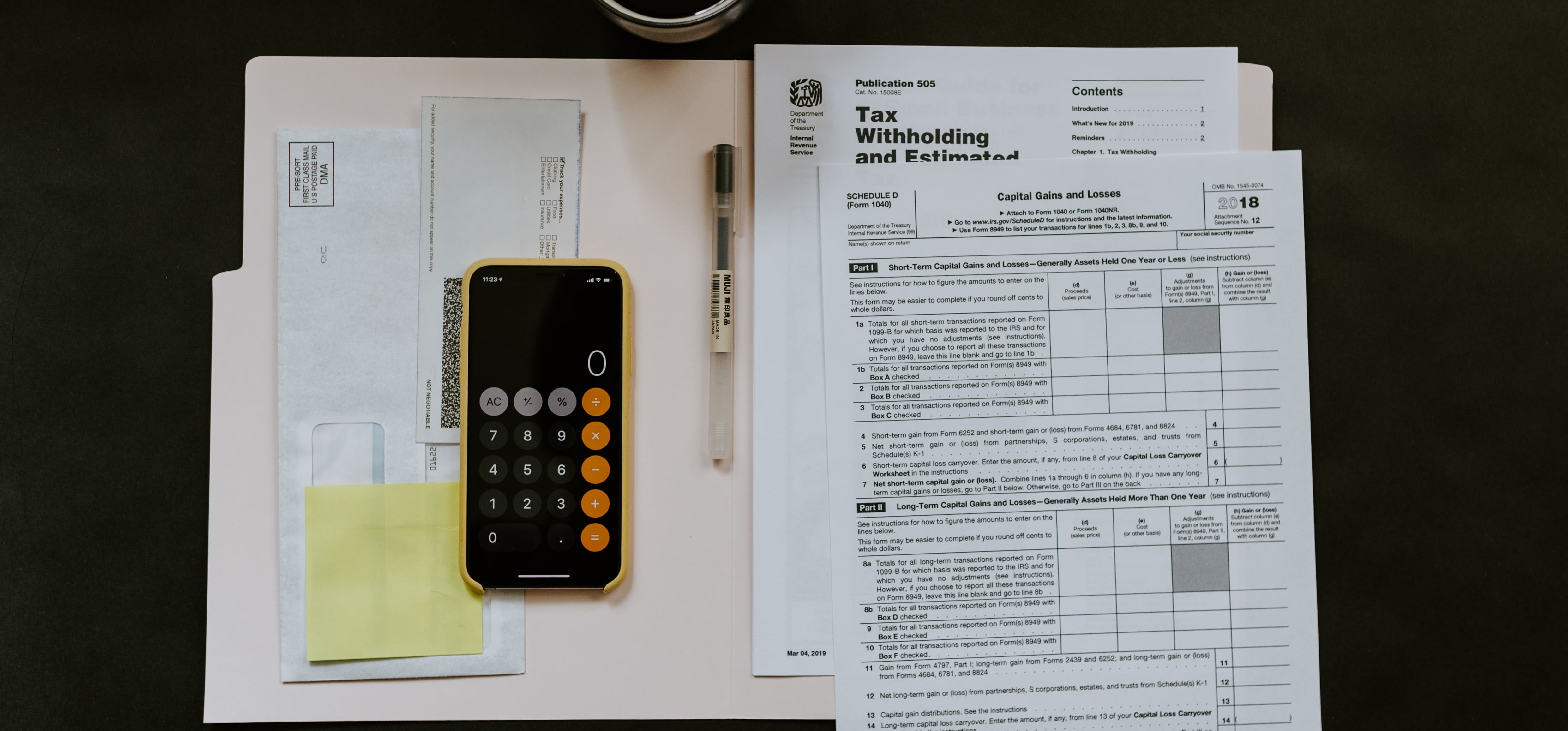 A collection of accounting documents and invoices neatly organized on a desk, showcasing financial records and transactions.